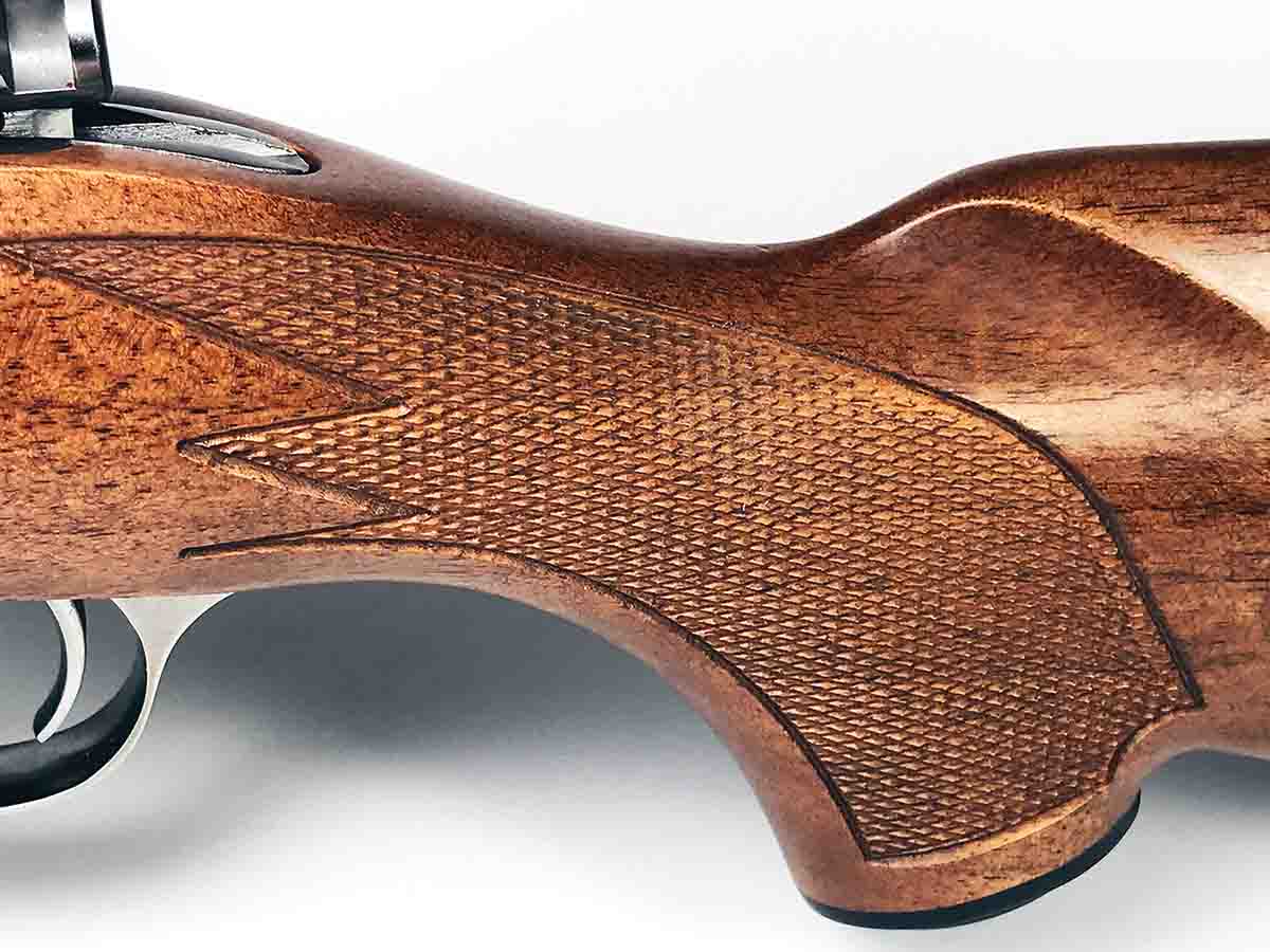 The Ruger Hawkeye Hunter stock has large panels of machine-cut checkering.